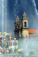 RTW0187  Fountain and church in Braga