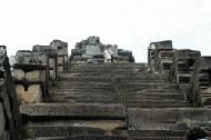 Paul climbs up an Angkor Thom temple