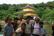 Hayato, a former international student who stayed with us, and his parents, Takako and Ikurou, pose for a picture in front of the Golden Temple, a UNESCO World Heritage Site, in Kyoto.