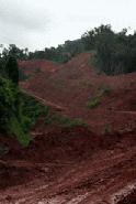 The road from Huay Xai to Luang Nam Tha looks like this. Road construction is ever present, there are no barriers preventing fall off the shoulder of the road and the entire road is through mountainious terrain on a very slippery, red clay road.